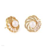 Delightful pearl swirl gold earrings