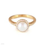Delicate pearl gold ring
