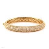 Delicate micropave curved gold bracelet