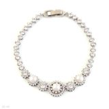 Divine detailed pearls silver bracelet