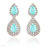 Fancy 2 drop halo iced turquoise silver earrings