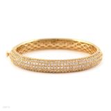 Delicate micropave curved gold bracelet