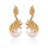 Elaborate pearl gold earrings