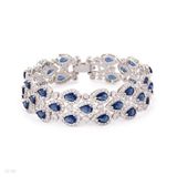Magnificent pear drop triple row blue bracelet