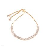 Dazzling baguette adjustable gold tennis bracelet