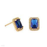 Royal blue emerald cut halo gold tops