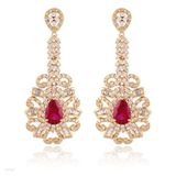 Edgy shield gold red drop earrings