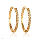 Contemporary geometric gold hoops